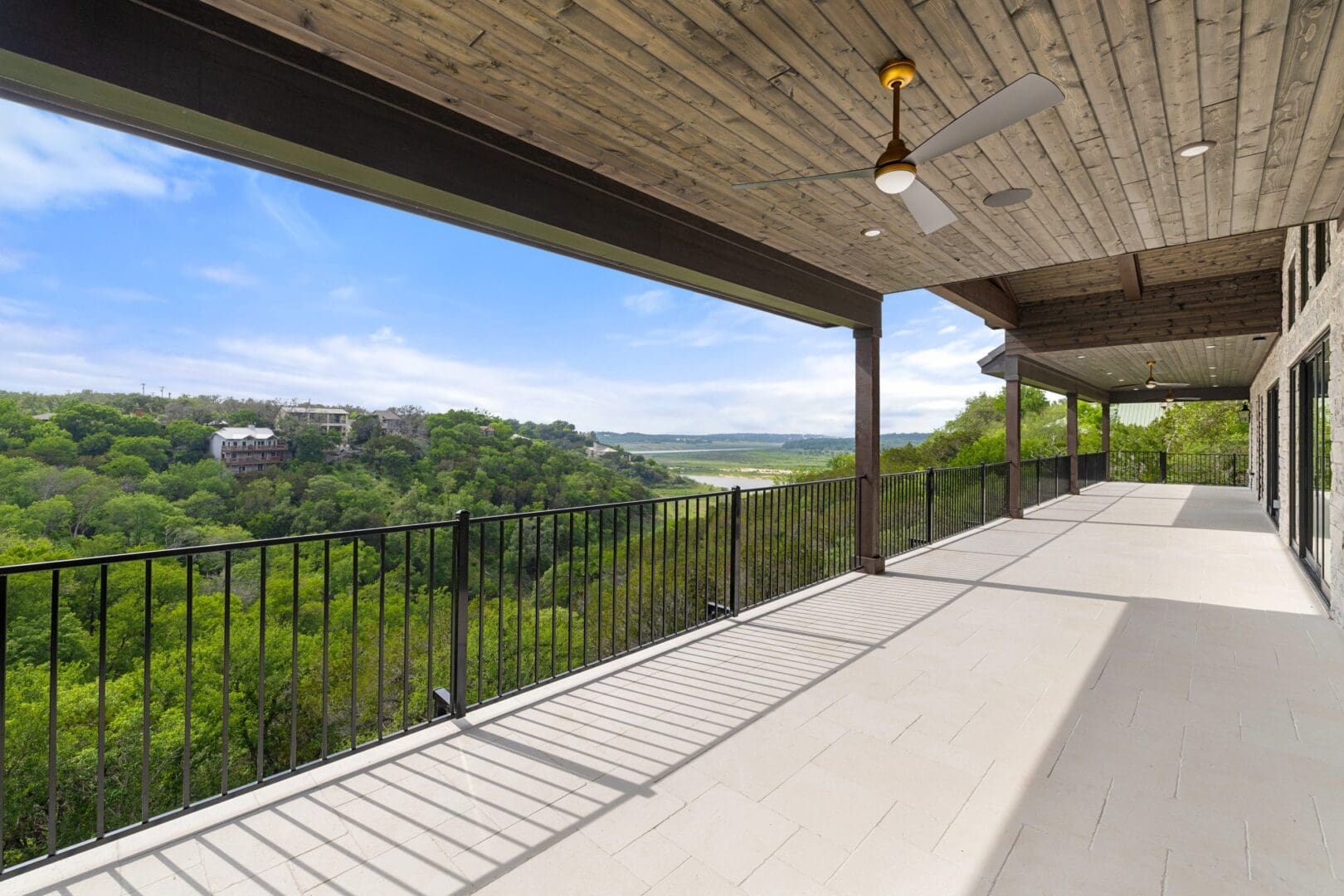 Spacious balcony with scenic green valley and mountains view.